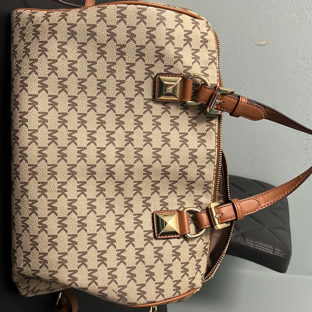 original used Michael Kors. Check picture for bag details.